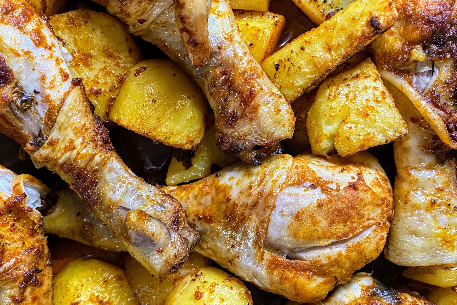 Crockpot BBQ chicken drumsticks with golden potatoes