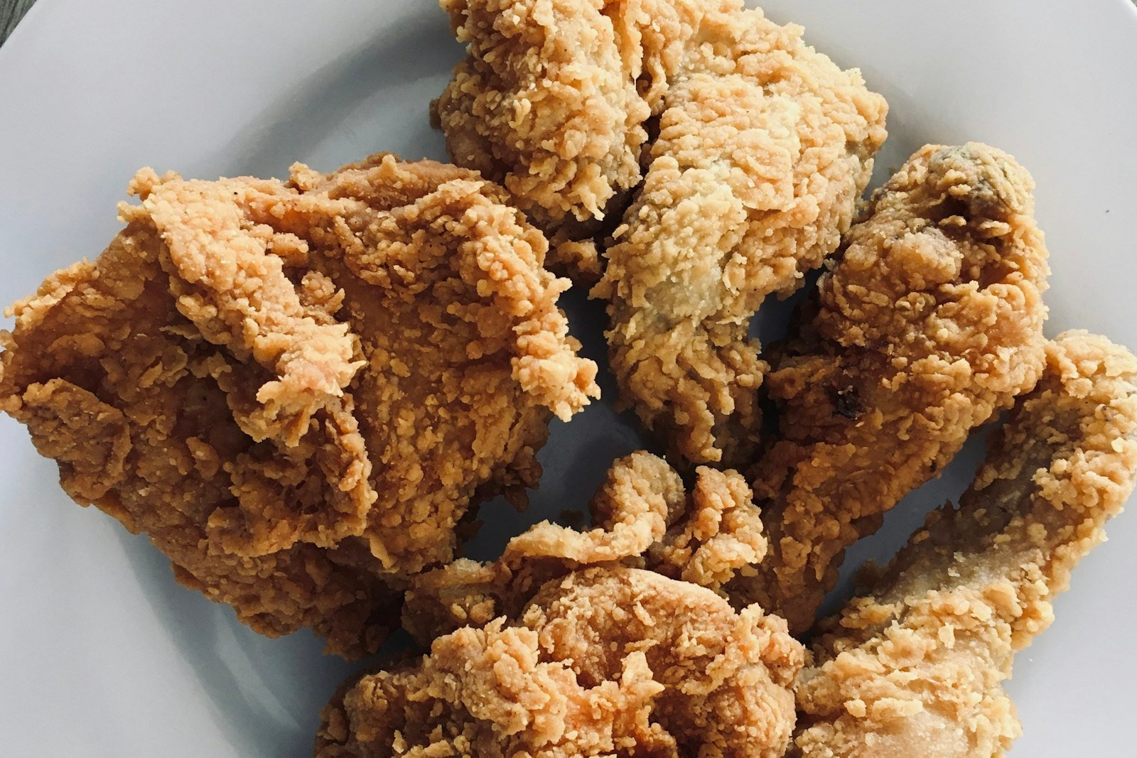 A close look at the crunchy pretzel coating after baking, with the juicy chicken inside